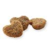 Primer plano de las croquetas extrusionadas del pienso Versele Laga Ratas Complete, fórmula todo en uno.