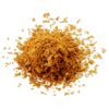 Porción de alimento en escamas Tetra Betta sobre un fondo blanco, mostrando la calidad del producto.