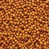 Primer plano de los pellets del alimento para tucan NutriBird T16, mostrando su textura y calidad superior.