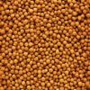 Primer plano de la textura de los pellets de NutriBird F-16, un alimento insectivoros de alta calidad.