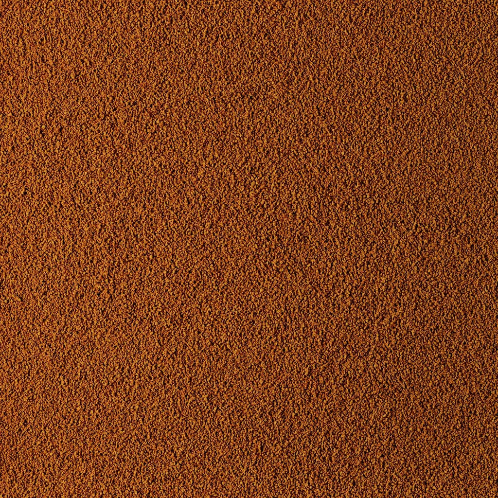Textura de cerca de los Gránulos Tetra Discus, alimento premium de hundimiento lento para peces disco.